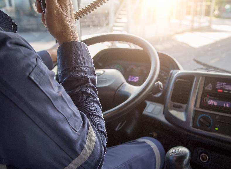 someone using a radio in a truck